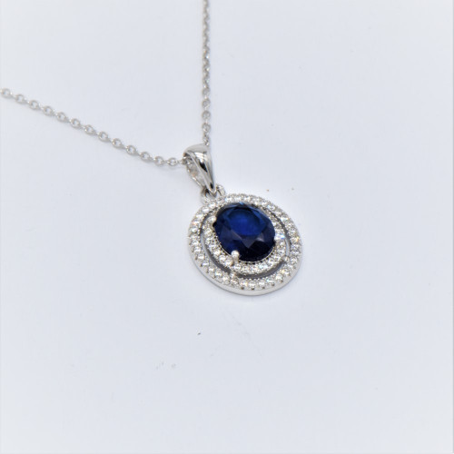 hand made silver pendant with blue zirconia